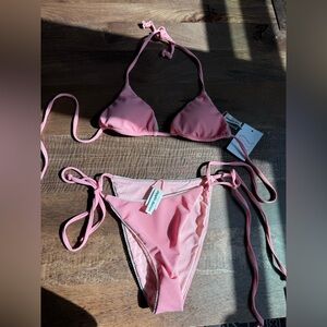 NWT Dippin’ Daisy pink 2 piece bikini. Size M. Hygiene liner included
